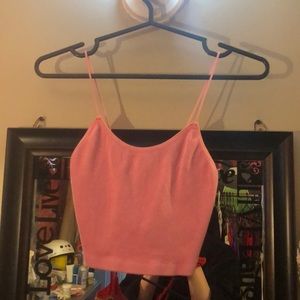 Pink and red cropped tank tops